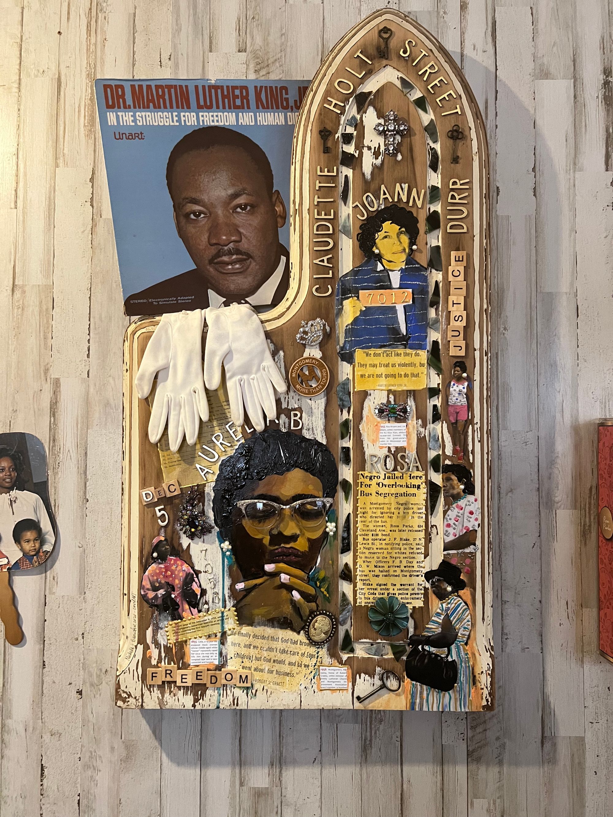 An image of an assemblage art work featuring Martin Luther King Jr., Aurelia, Browder, Rosa Parks and other Civil Rights figures.