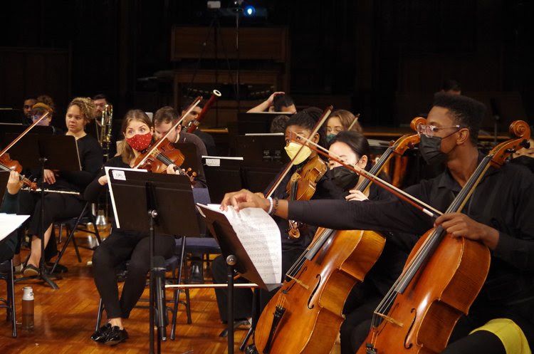 A-group-of-diverse-musicians-play-in-an-orchestra