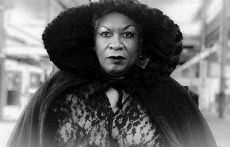Black-and-white-image-of-Doris-Fields-in-a-hooded-cape