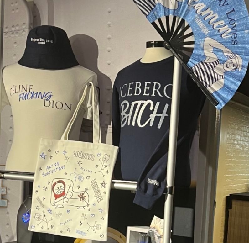 Stand with t-shirts that read Celine fucking Dion and Iceberg Bitch
