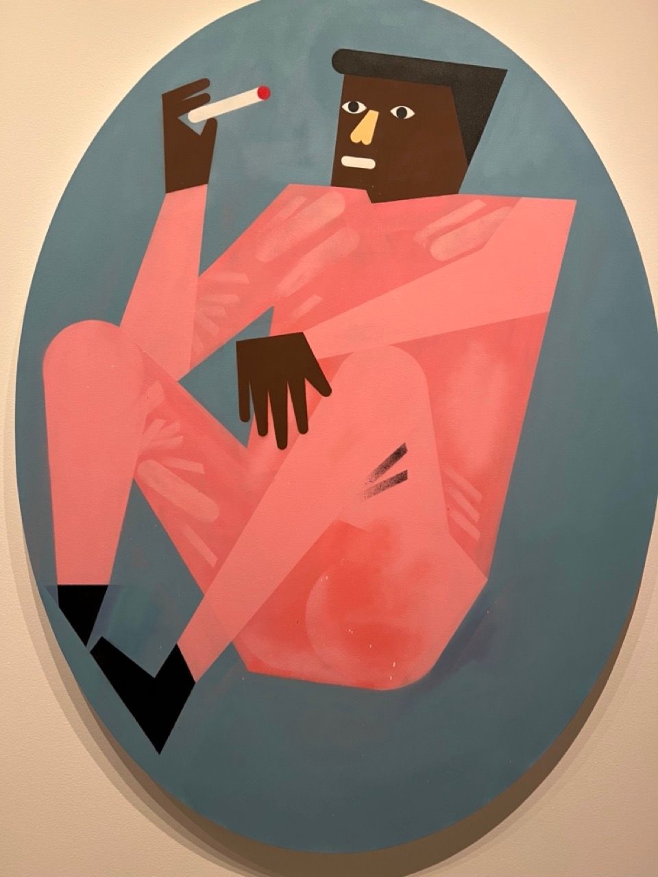 A collaged figure of a person wearing pink