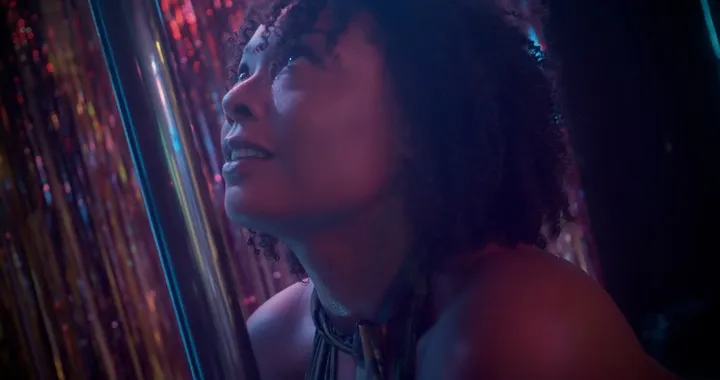 Still from NatsHoney performing pole dance in a mini-documentary showcasing her work. Credit: Thane Montgomery